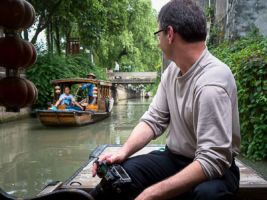 A participant on a tour takes a moment between shots to enjoy the view.