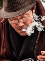 When asked, this elderly gentleman did not originally want his photo taken. Upon walking away, he called the photographer back and gave his consent.